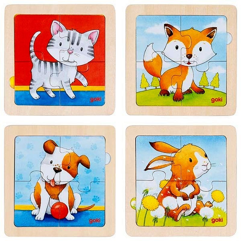 Lot de 4 puzzles en bois de 4 pièces dans un cadre.